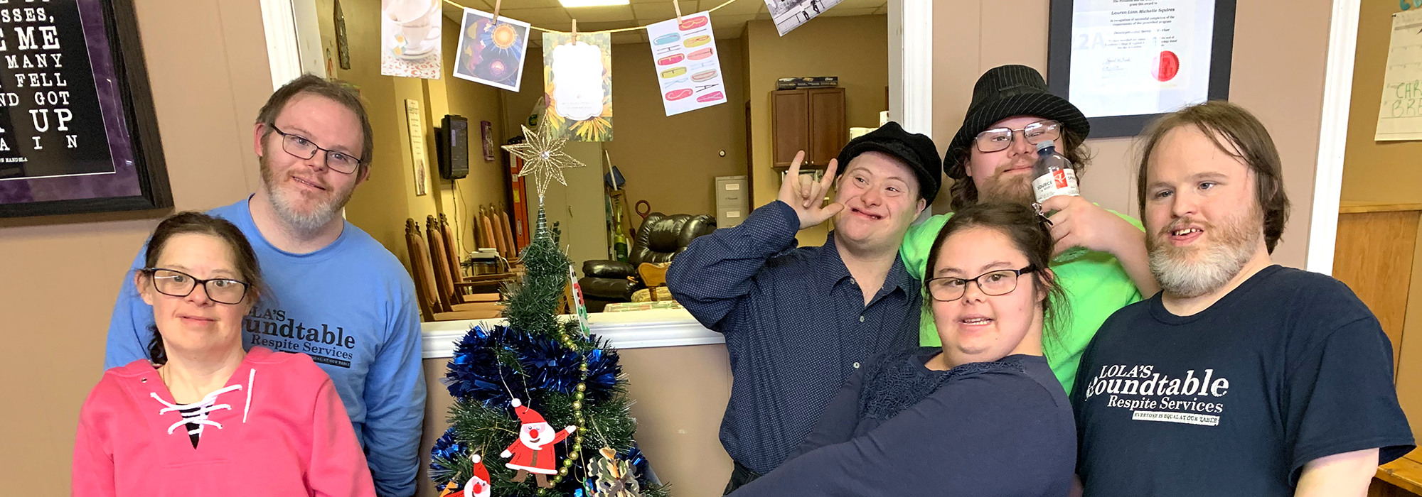 Group near Christmas tree slide