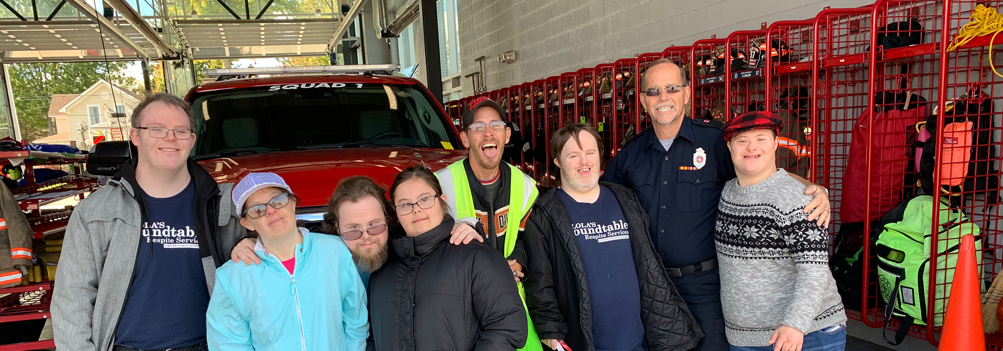 Group at fire station slide